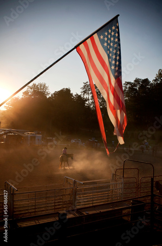 A dusty evening at the rodeo. photo
