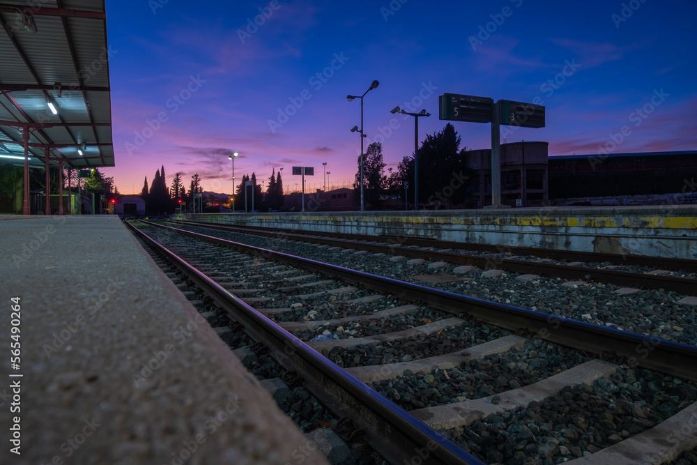 Fototapeta premium View of tracks at the train station in Ronda at night