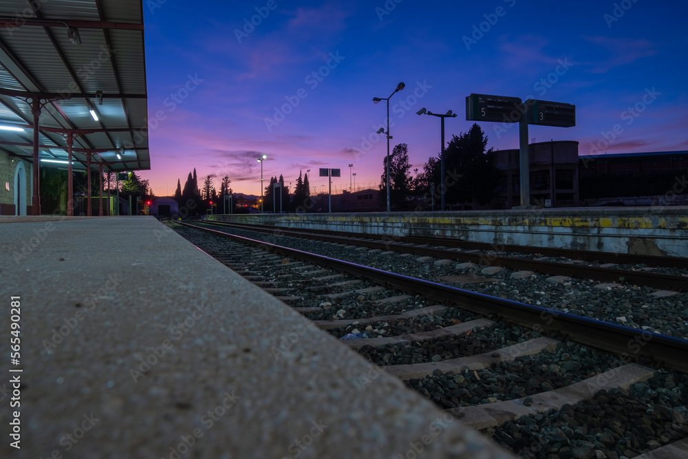 View of tracks at the train station in Ronda at night