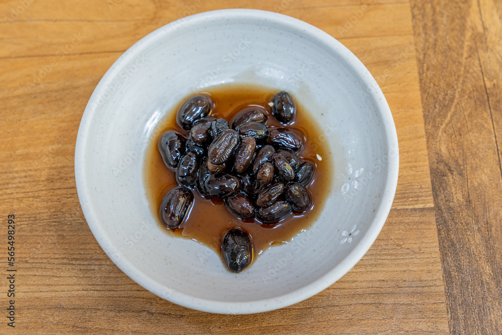 Beans in soy sauce, a side dish at a Korean restaurant Beans in soy sauce, a side dish at a Korean restaurant