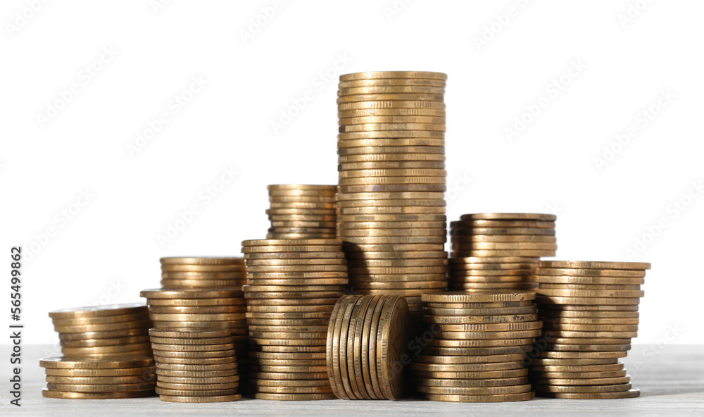 Stack of coins on wooden table, closeup Stack of coins on wooden table, closeup