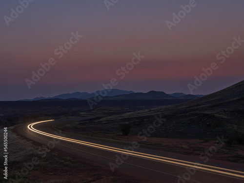 light trails with mountains