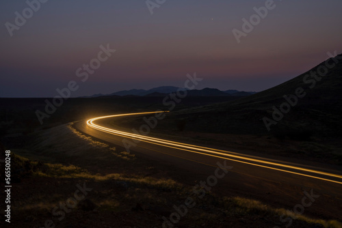 light trails with mountains