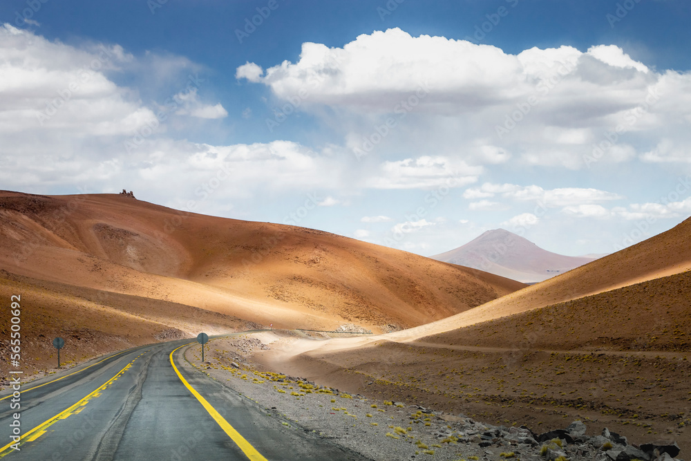 Road in Moon Valley dramatic landscape at Sunset, Atacama Desert, Chile Road in Moon Valley dramatic landscape at Sunset, Atacama Desert, Chile
