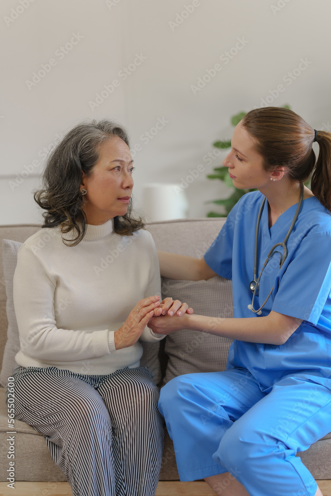 Female doctor taking a history of a patient and counseling on orthopedic diseases with female patients after measuring blood pressure and heart rate in a medical facility