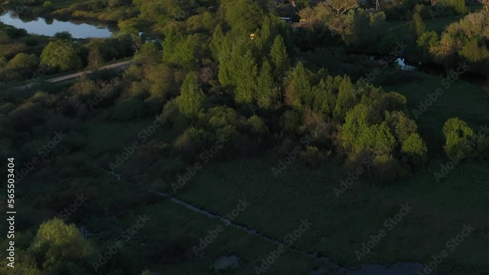 Amazing scenery of swamp river surrounded by green pastures with stunning landscape cinematic views. Concept climate outdoor nature. Amazing scenery of swamp river surrounded by green pastures with stunning landscape cinematic views. Concept climate outdoor nature.