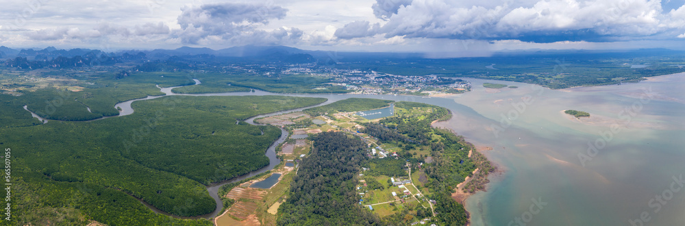 Panoramic aerial view of Krabi town and the rivers flowing by on a rainy day. Thailand.