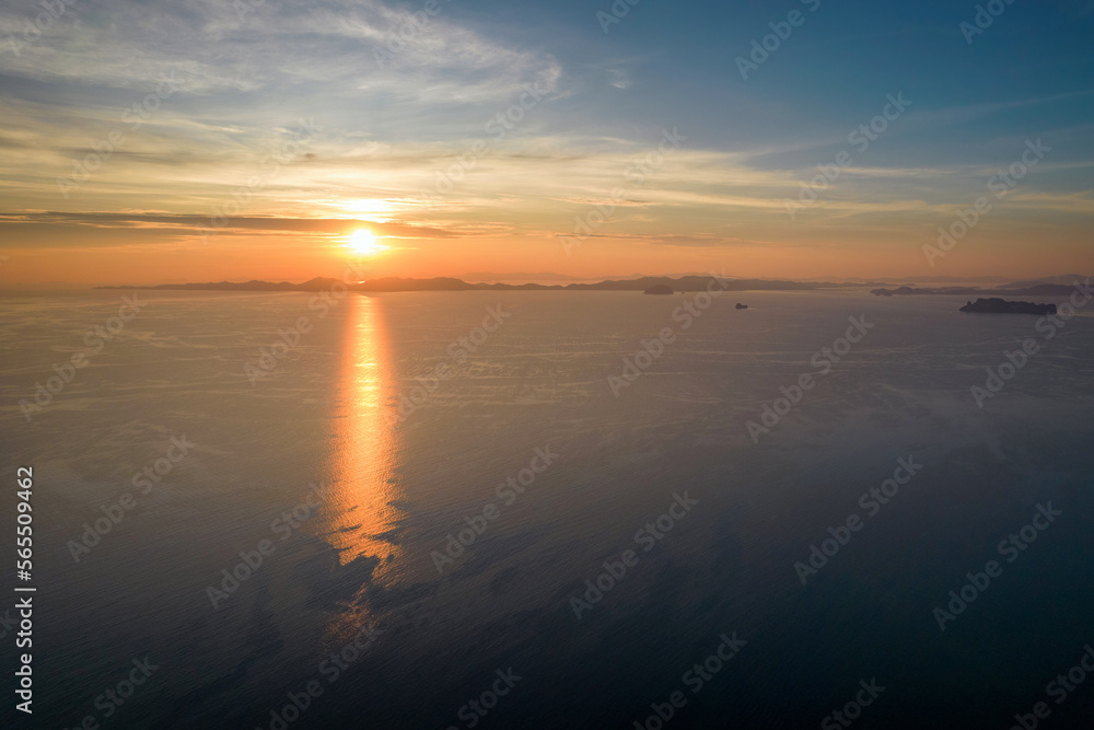 Obraz premium Aerial view of sunset above the sea. View from above Klong Muang Beach. Krabi Province, Thailand.