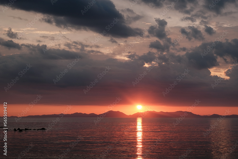 Sunset above the sea. View from Klong Muang Beach. Krabi Province, Thailand.