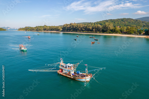 Drone view of squid fishing boats on sunny day. Klong Muang Beach, Krabi Province, Thailand.