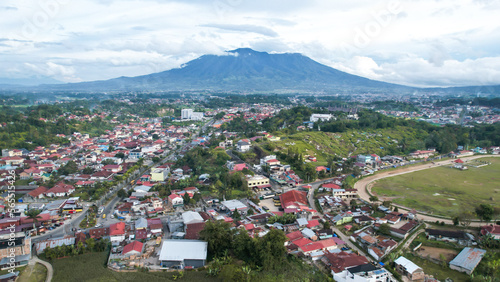 Aerial view of Horse racecourse field in bukittinggi with mountain view. 