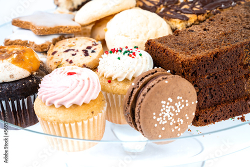 Collection of sweet treats on a white background. Baked goods presentation concept. photo