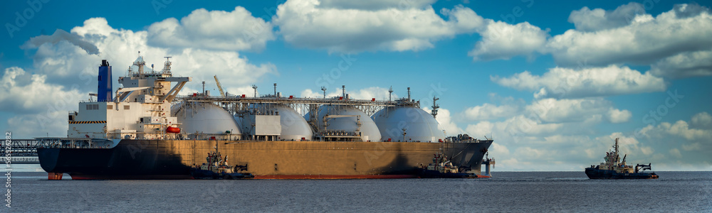 Fototapeta premium Oil and gas industry .Tanker for transportation of liquefied natural gas during mooring at the LNG marine terminal.