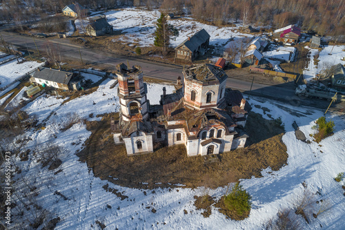 Old abandoned Church of the Nativity (1915) in a rural landscape on a April afternoon (aerial view). Verkhruchey, Karelia. Russia