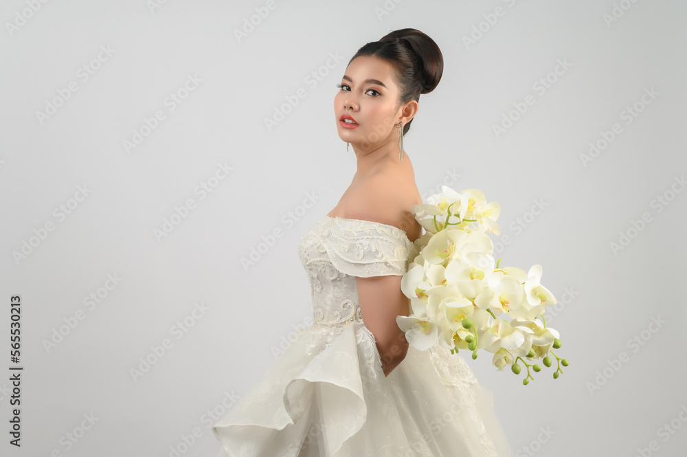 Young asian beautiful bride smile with happy on white background Young asian beautiful bride smile with happy on white background