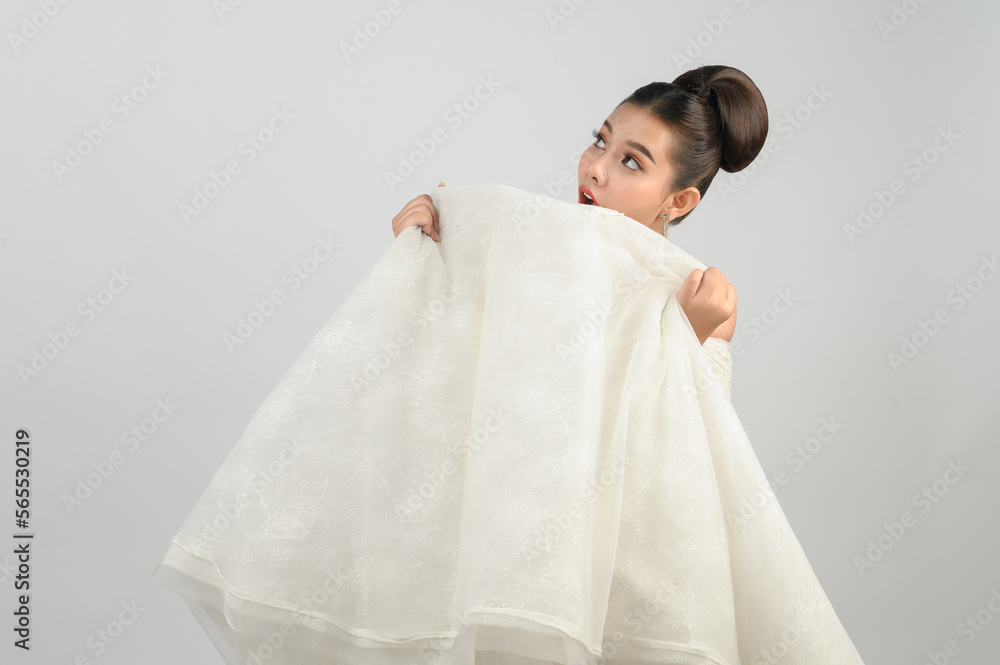 Young asian beautiful bride pose with excited feel on white background Young asian beautiful bride pose with excited feel on white background