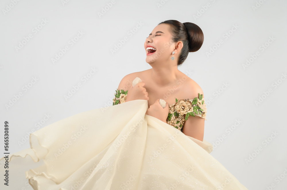 Young asian beautiful bride smiling with happy on white background Young asian beautiful bride smiling with happy on white background