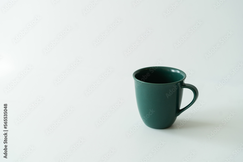 an empty green cup an empty green cup