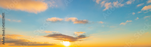 Clouds and evening sky,Real majestic sunrise sundown sky background with gentle colorful clouds without birds. Panoramic, big size