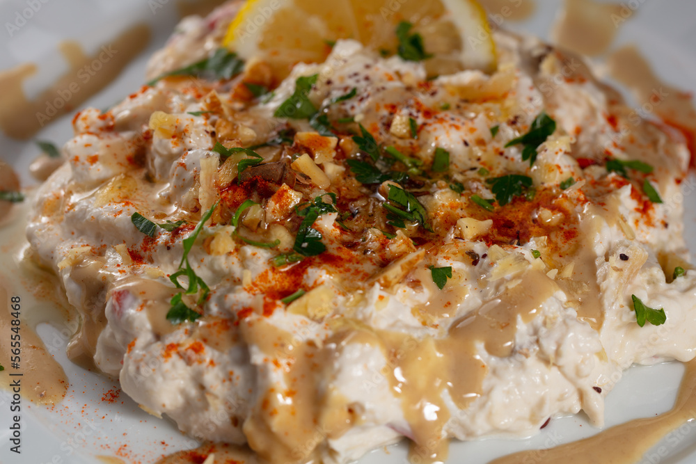 Traditional Turkish cuisine, Appetizer, salad made with eggplant and yoghurt. local name, Mutebbel. High quality photo Traditional Turkish cuisine, Appetizer, salad made with eggplant and yoghurt. local name, Mutebbel. High quality photo
