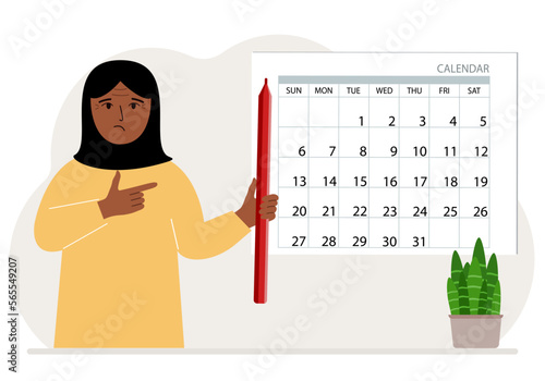 A woman with a pencil in his hand creates a calendar. Planning and time management, responsible employee plans meetings and events.