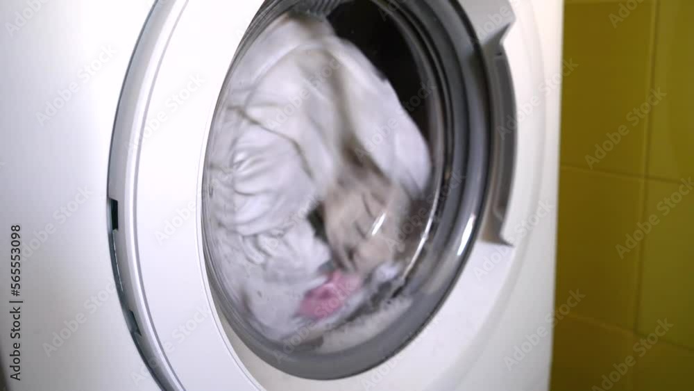 Modern washing machine, Clothes washing machine in laundry, Laundry being done at home. Modern washing machine, Clothes washing machine in laundry, Laundry being done at home.