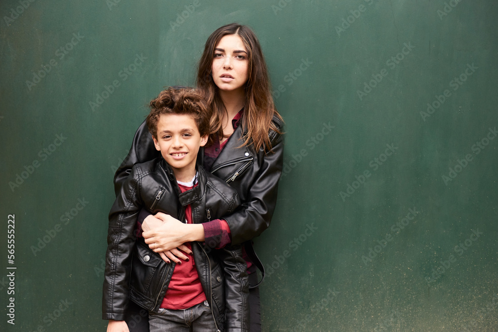 Stylish Brother And Sister In Leather Jackets. Young woman in leather