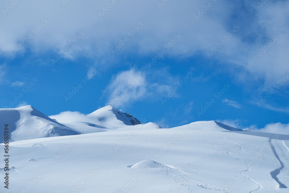 Image of a snow-capped mountain top. Image of a snow-capped mountain top.