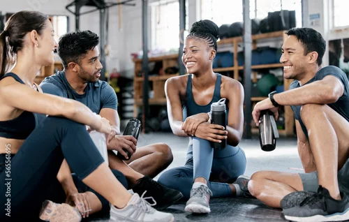 Panel kuchenny z motywem Fitness, conversation and friends at the gym for training, exercise motivation and relax after cardio. Laughing, happy and people with a group discussion about a workout, health class and performance