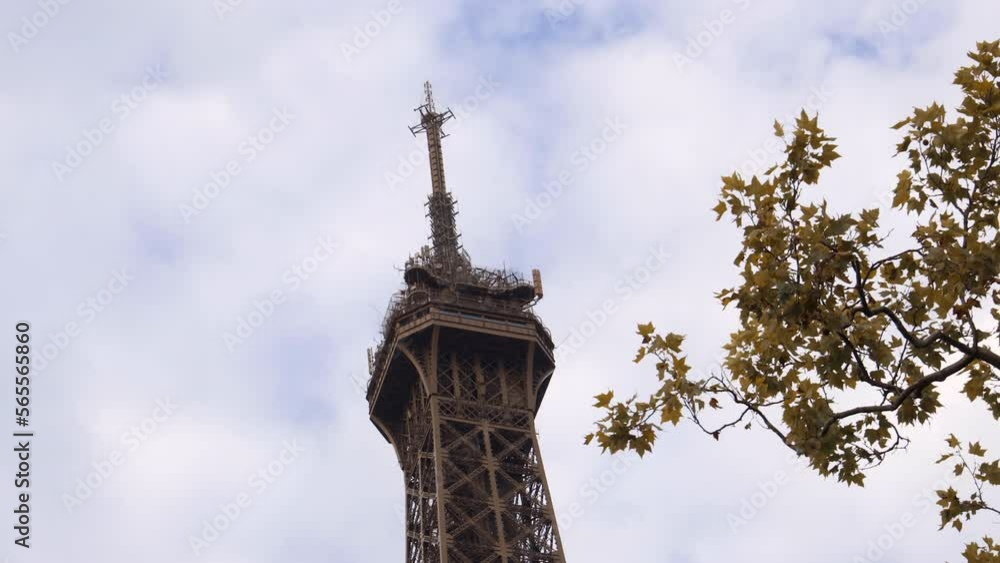Top of the Eiffel Tower on a day of Autumn in October in Paris, France Top of the Eiffel Tower on a day of Autumn in October in Paris, France