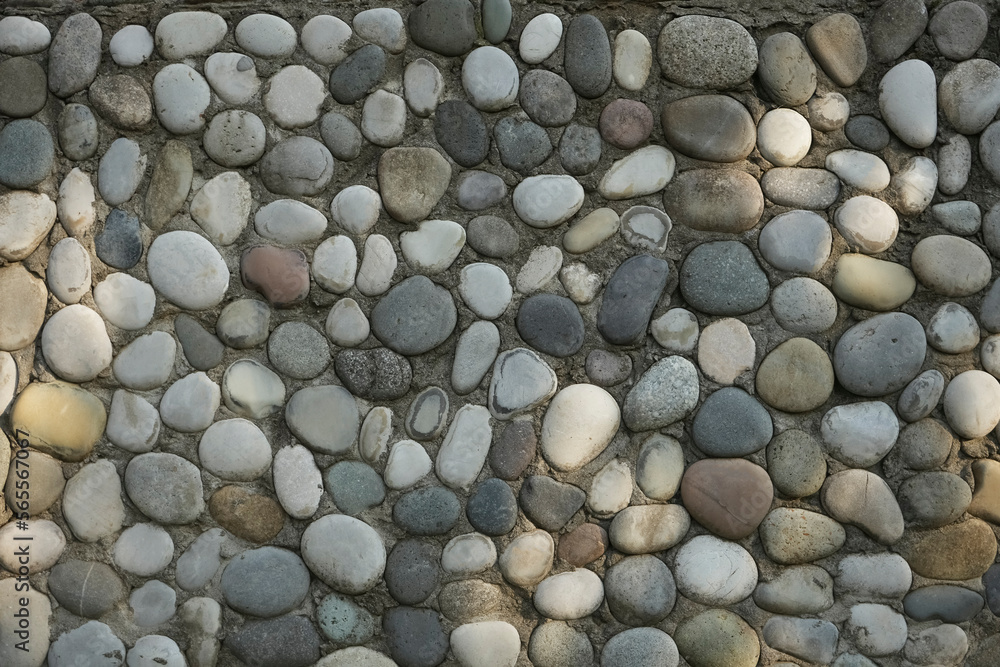 background of concrete with gray white round stone. pebbles wall or floor. background of concrete with gray white round stone. pebbles wall or floor.