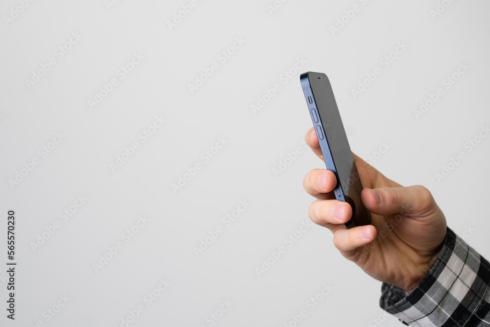 person using finger scan to unlock his smartphone person using finger scan to unlock his smartphone