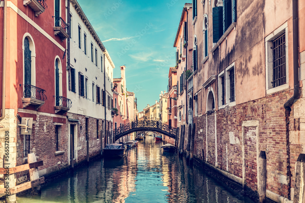 Canal with bridge in Venice, Italy.