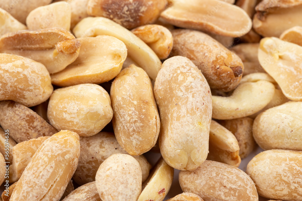 Peanuts. Close up of fried, peeled and salted peanuts. Peanuts. Close up of fried, peeled and salted peanuts.
