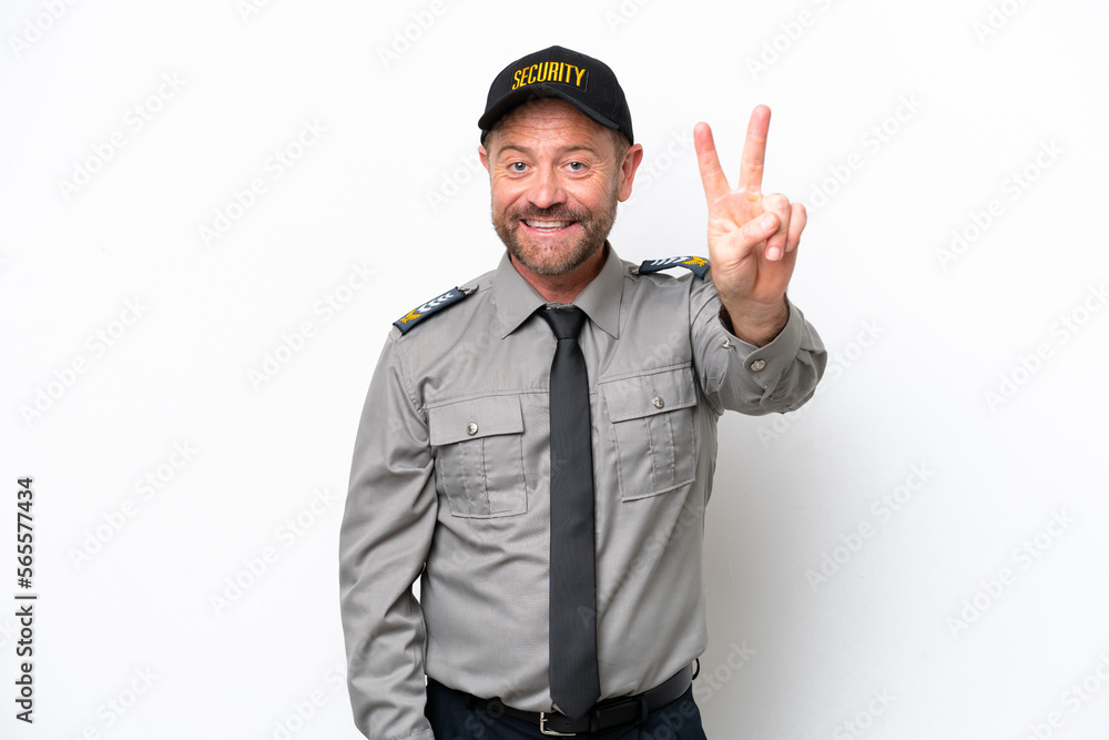 Middle age security man isolated on white background smiling and showing victory sign Middle age security man isolated on white background smiling and showing victory sign