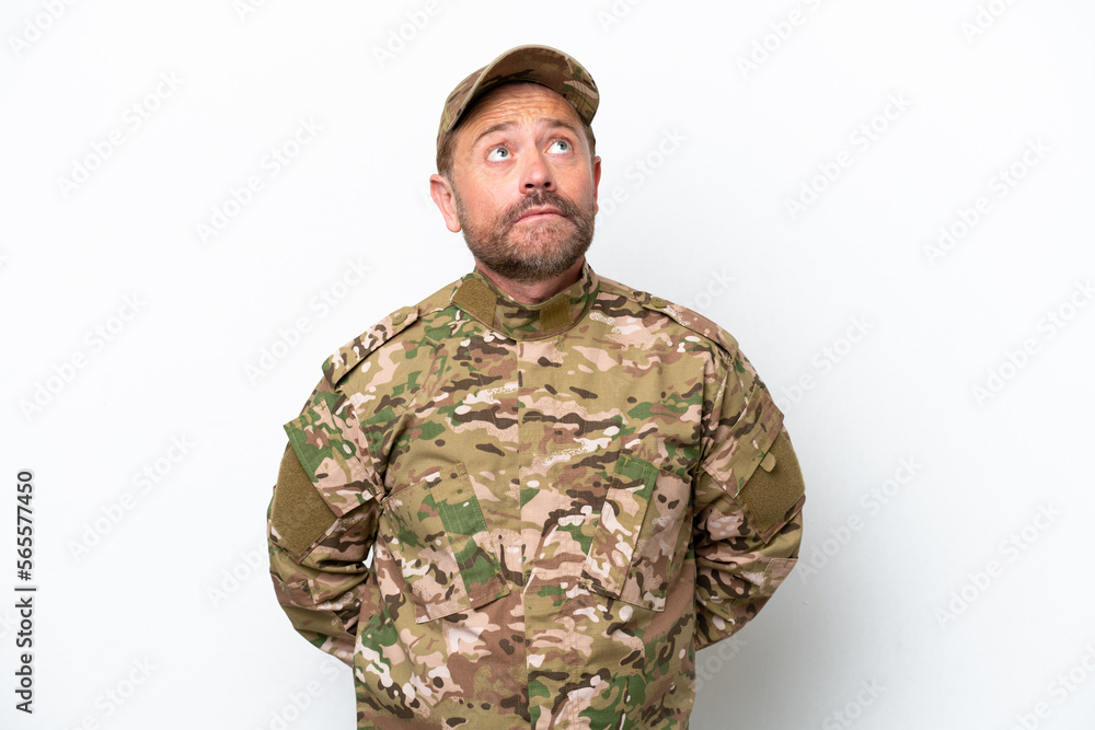 Military man isolated on white background and looking up Military man isolated on white background and looking up