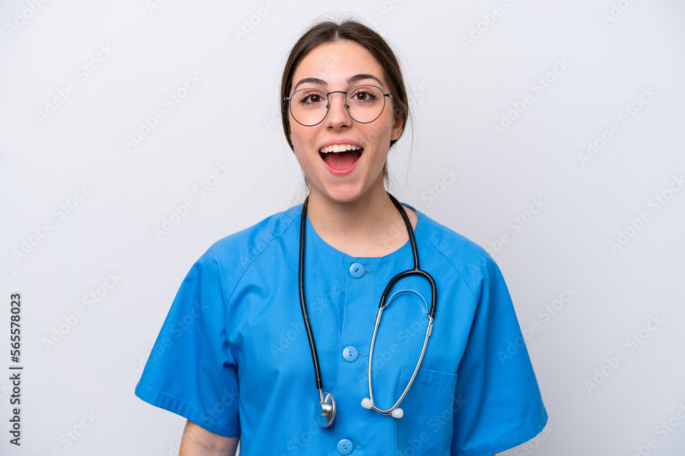surgeon doctor woman holding tools isolated on white background with surprise facial expression surgeon doctor woman holding tools isolated on white background with surprise facial expression