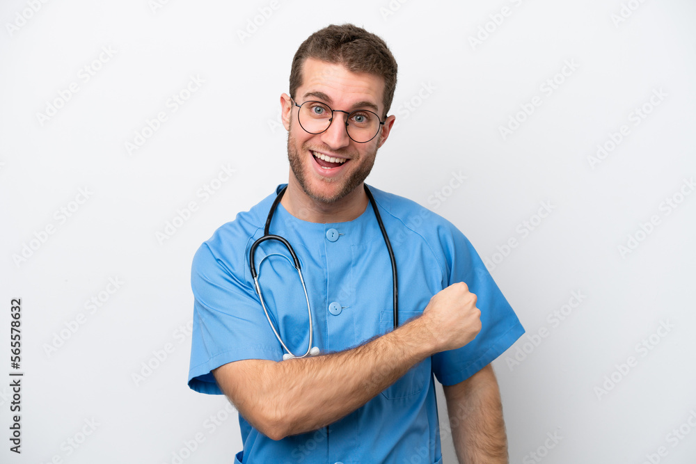 Young surgeon doctor caucasian man isolated on white background celebrating a victory Young surgeon doctor caucasian man isolated on white background celebrating a victory