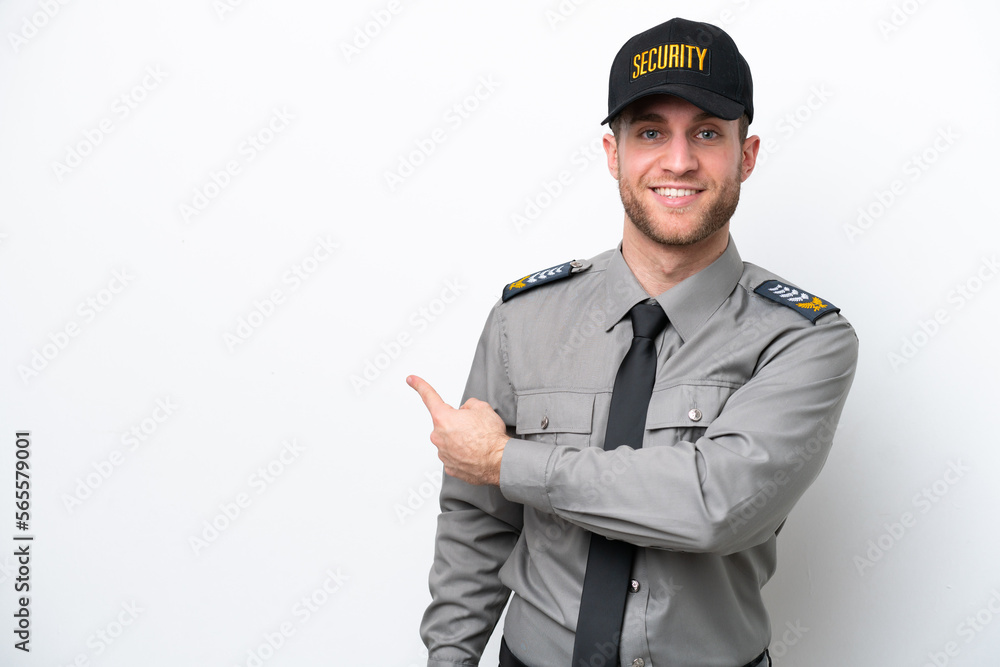 Young safeguard caucasian man isolated on white background pointing back Young safeguard caucasian man isolated on white background pointing back