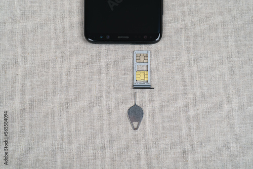 Pin and open slot for 2 SIM cards. Top view
