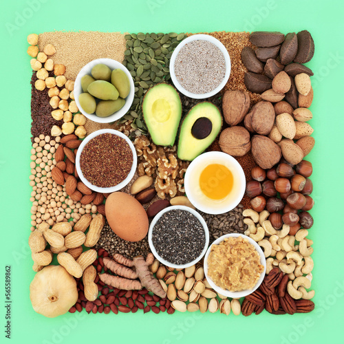 Essential fatty acid foods high in healthy lipids. Ingredients contain unsaturated good fats for healthy heart and cholesterol levels with nuts, seeds, dairy, vegetables, legumes and grain. 