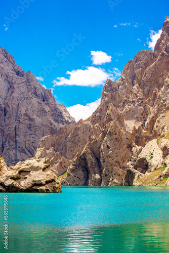 Mountain blue lake among the rocks. Beautiful landscape. Wonderful nature. Long banner, panoramic view