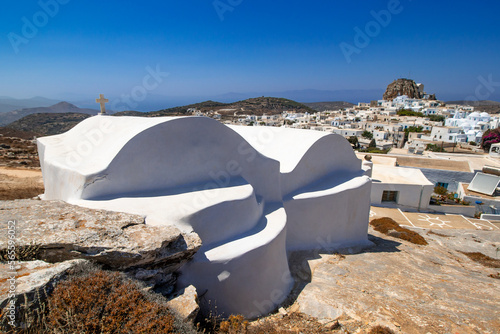 A orthodox twin white chapel over the village of Chora in the island of Amorgos, Greece. photo