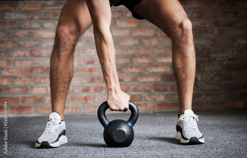 Kettlebell training, exercise and man hands for weightlifting, fitness workout and sports challenge in gym. Closeup of athlete, body builder and holding heavy weights for wellness, muscle and power