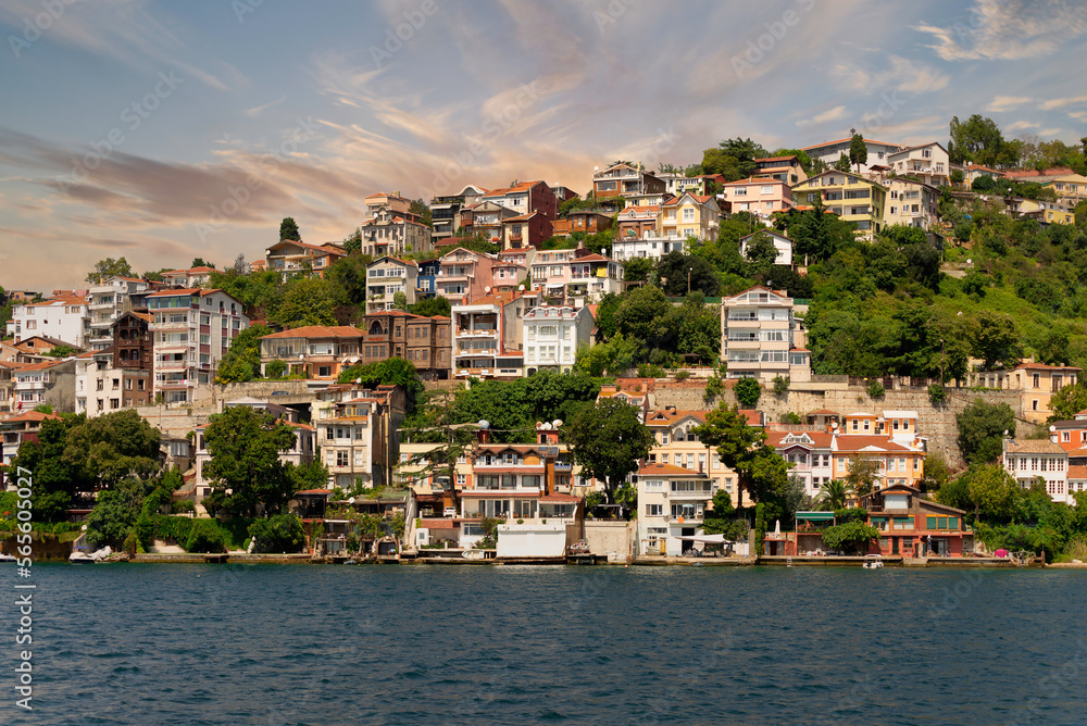 View from the sea of the green mountains of the Europian side of Bosphorus strait, with traditional houses and dense trees in a summer day before sunset, Istanbul, Turkey View from the sea of the green mountains of the Europian side of Bosphorus strait, with traditional houses and dense trees in a summer day before sunset, Istanbul, Turkey