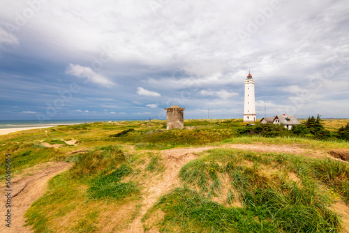 Blavand Lighthouse is a seacoast lighthouse in Blavandshuk near Esbjerg, Denmark and was built in 1900. Blavandshuk is the westernmost point in Denmark. photo