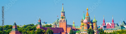 Spasskaya Tower of Moscow Kremlin and Cathedral of Vasily the Blessed (Saint Basil's Cathedral) on Red Square in sunny summer day.  Panorama. Moscow. Russia