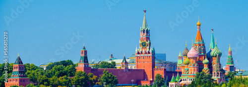Spasskaya Tower of Moscow Kremlin and Cathedral of Vasily the Blessed (Saint Basil's Cathedral) on Red Square in sunny summer day. Panoramic view. Moscow. Russia