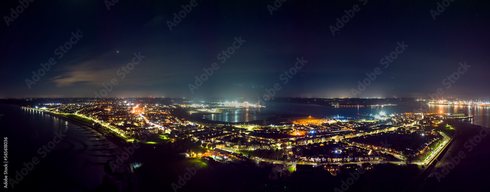 Fototapeta premium An aerial view of the ports of Harwich and Felixstowe at night in the UK