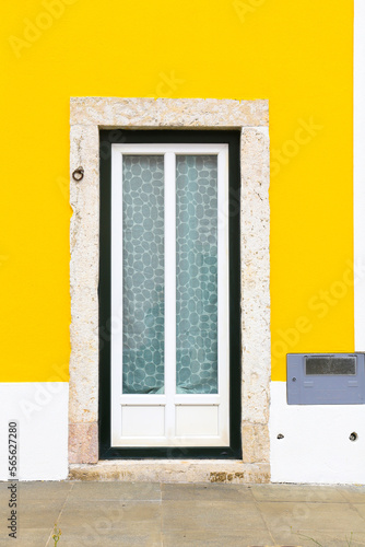 Typical vintage portuguese facade with white window